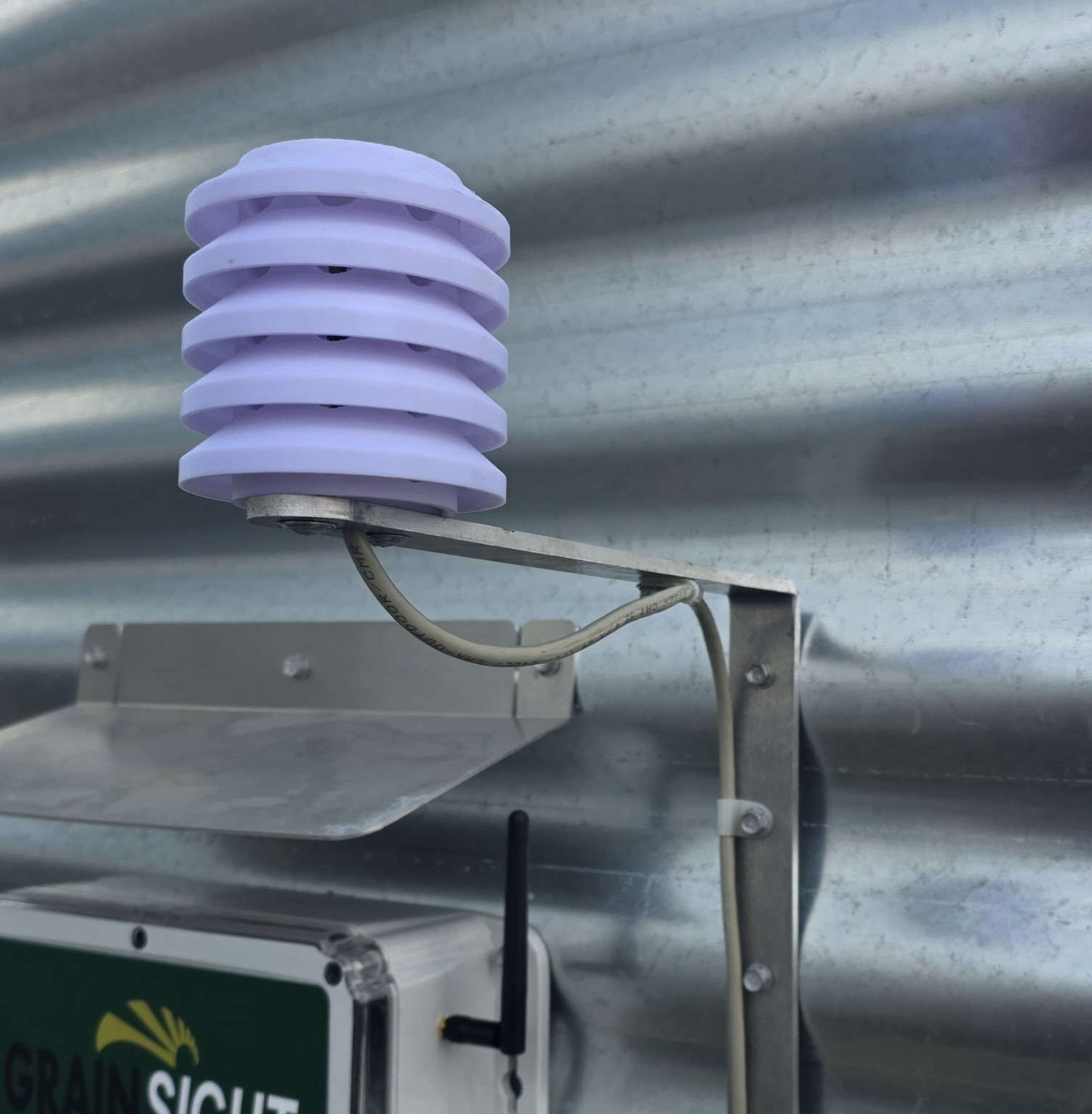Ambient EMC sensor mounted above a GrainSight Bin Controller